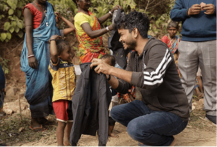 Warm meal distribution in tribal settlement